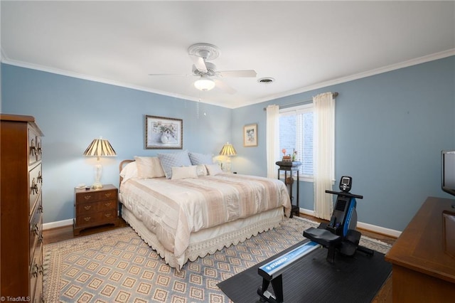 bedroom with crown molding and ceiling fan