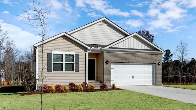 craftsman inspired home featuring a garage and a front yard