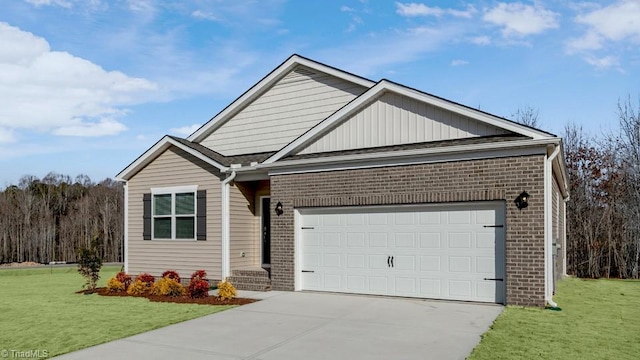view of front of house with a garage and a front yard