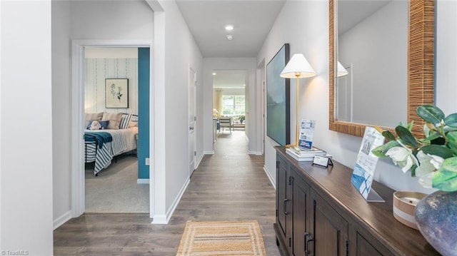 hallway featuring dark wood-type flooring