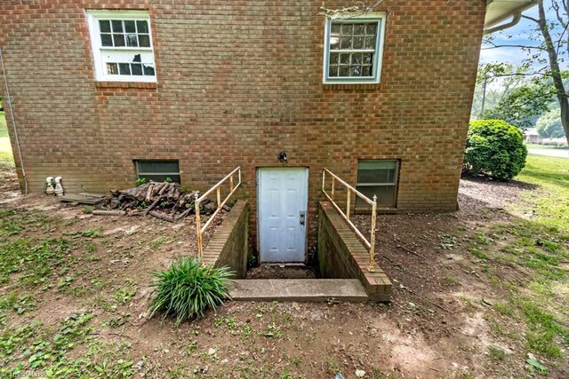 1281 Woodbrook Dr, Kernersville, NC 27284 - rear view of property featuring brick siding