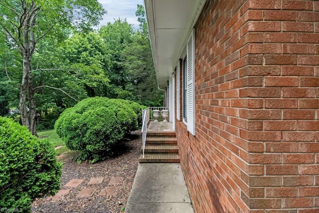 1281 Woodbrook Dr, Kernersville, NC 27284 - view of property exterior featuring brick siding
