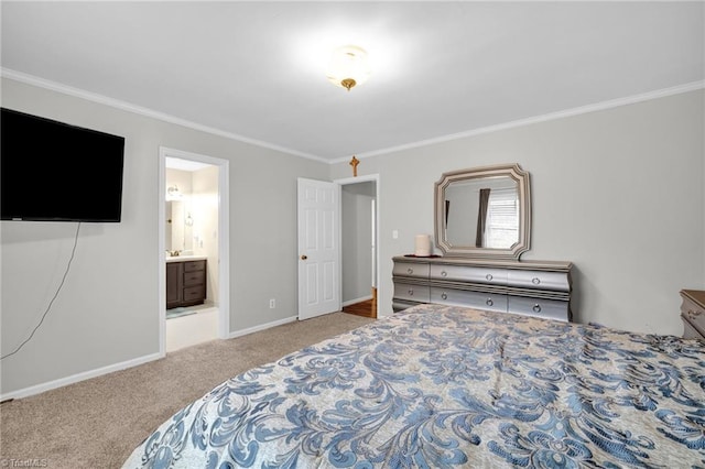 carpeted bedroom with connected bathroom and ornamental molding