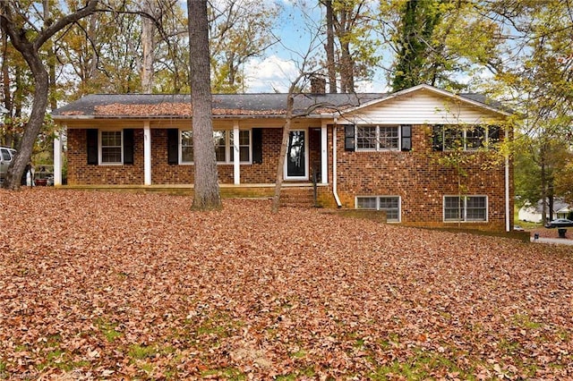 1526 Ann Arbor Ct, High Point, NC 27265 - view of front of house with brick siding and a chimney