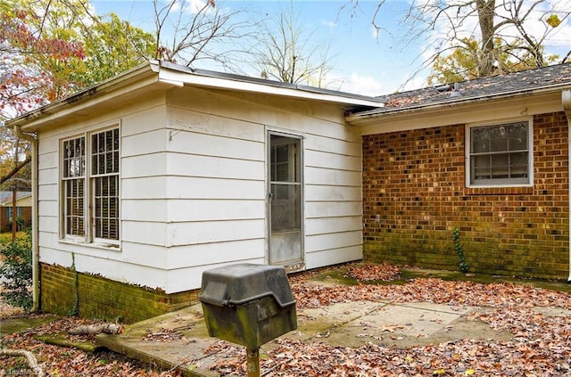 1526 Ann Arbor Ct, High Point, NC 27265 - view of home's exterior with a patio and brick siding