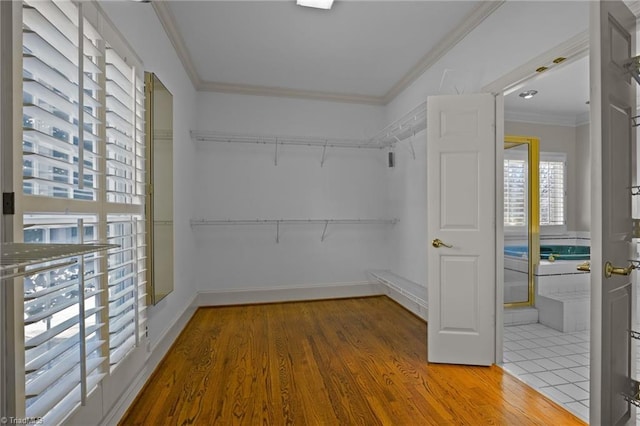 5005 Marble Arch Rd, Winston-Salem, NC 27104 - walk in closet featuring wood finished floors