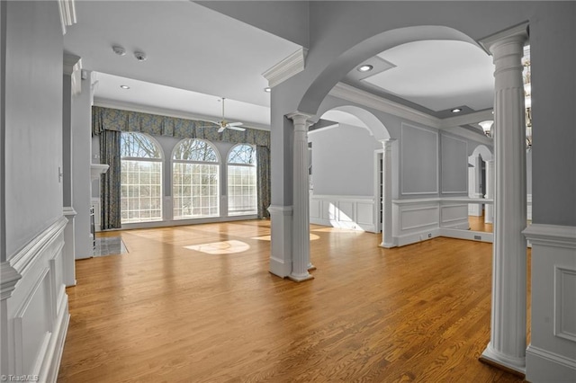 5005 Marble Arch Rd, Winston-Salem, NC 27104 - foyer featuring a decorative wall, ornamental molding, a ceiling fan, decorative columns, and wood finished floors