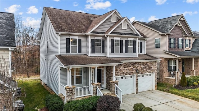 craftsman-style home with a garage and covered porch