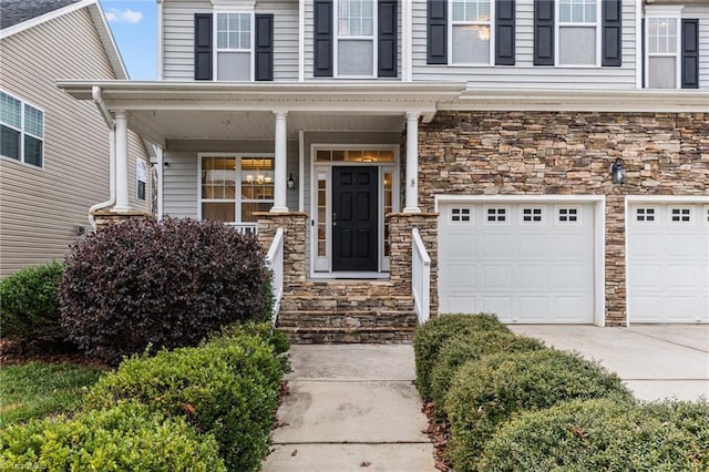 doorway to property with a porch