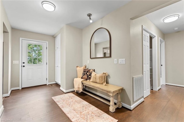 foyer featuring dark hardwood / wood-style floors