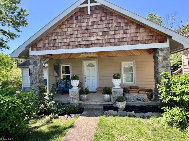 view of front of home featuring covered porch