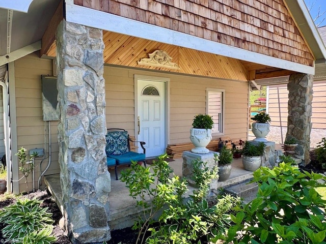 property entrance featuring covered porch