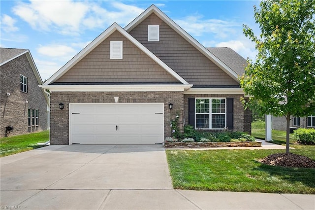 1417 Blooming Mountain Way, Kernersville, NC 27284 - craftsman inspired home featuring brick siding, an attached garage, driveway, and a front yard