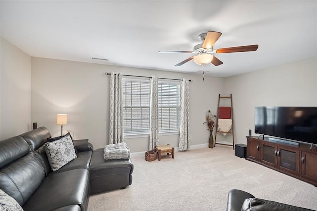 1417 Blooming Mountain Way, Kernersville, NC 27284 - carpeted living room with baseboards, a ceiling fan, and visible vents