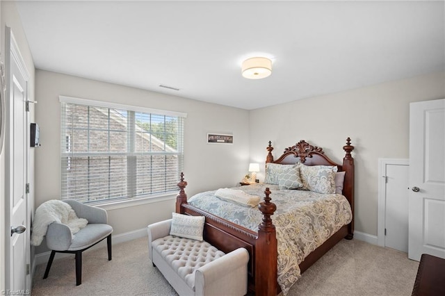 1417 Blooming Mountain Way, Kernersville, NC 27284 - bedroom with visible vents, baseboards, and light carpet