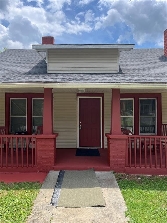 view of front of home featuring covered porch