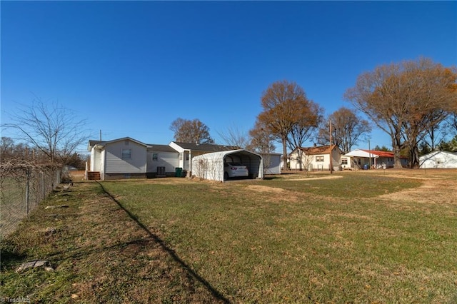 view of yard with a carport