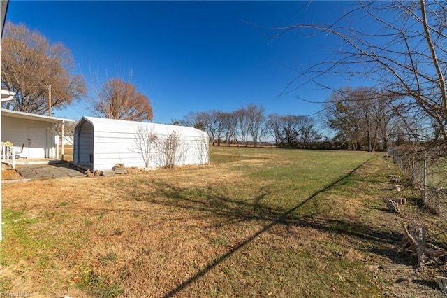 view of yard featuring a carport