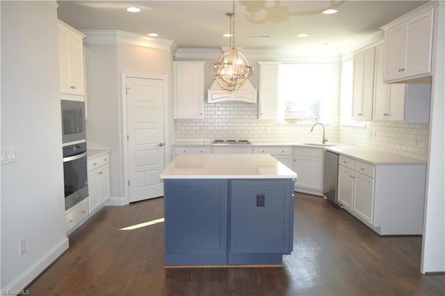 8113 Simon Dr Lot 38, Stokesdale, NC 27357 - kitchen with stainless steel appliances, a sink, a chandelier, recessed lighting, and light countertops