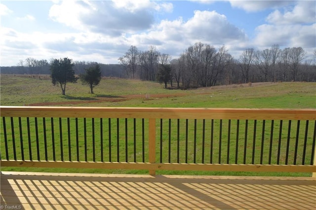 8113 Simon Dr Lot 38, Stokesdale, NC 27357 - deck featuring a yard and a view of rural / pastoral area