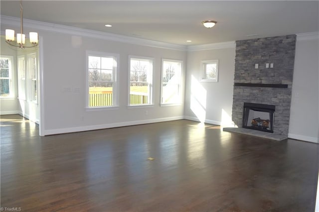 8113 Simon Dr Lot 38, Stokesdale, NC 27357 - unfurnished living room featuring crown molding, a chandelier, baseboards, a stone fireplace, and dark wood-style floors