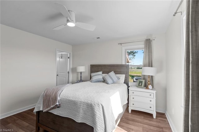 2281 Quarter Rd, Swanquarter, NC 27885 - bedroom featuring light wood finished floors, baseboards, and a ceiling fan