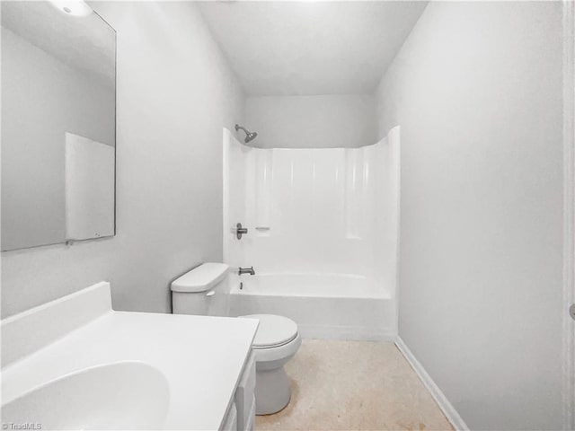 bathroom featuring toilet, baseboards, shower / washtub combination, and vanity