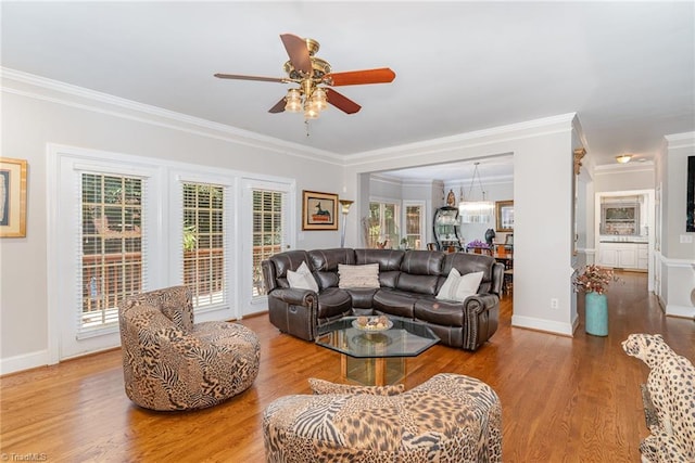 4002 Hobbs Rd, Greensboro, NC 27410 - living area featuring crown molding, a ceiling fan, and wood finished floors