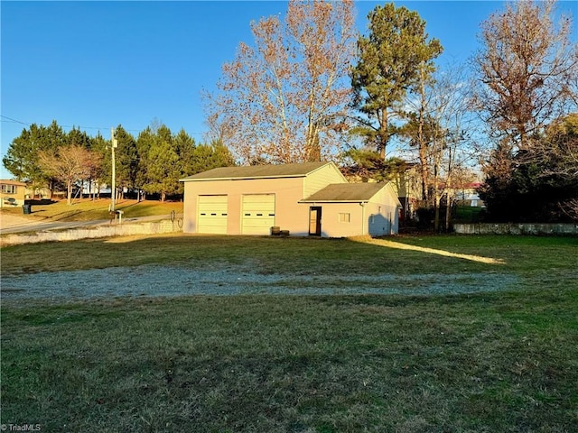 view of yard with a garage