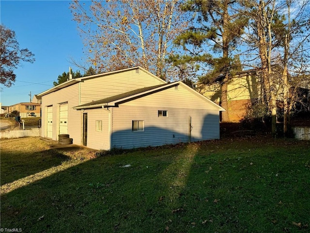 view of home's exterior featuring a lawn