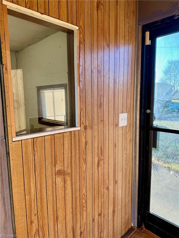 room details featuring wood walls