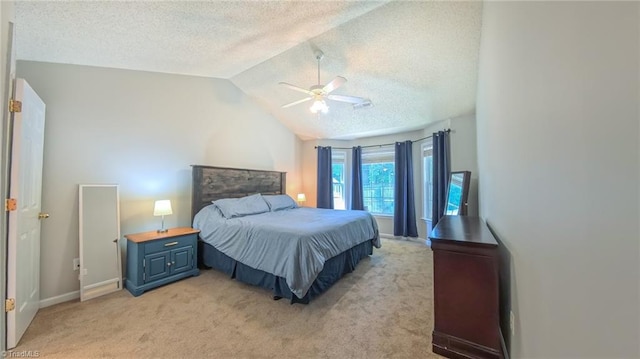 2309 Kasarda Dr, Greensboro, NC 27406 - bedroom with lofted ceiling, light colored carpet, a textured ceiling, a ceiling fan, and baseboards