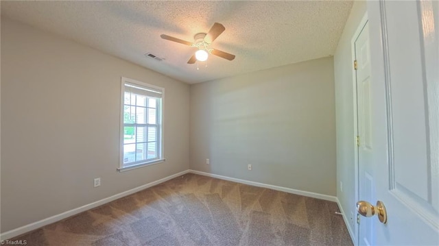 2309 Kasarda Dr, Greensboro, NC 27406 - spare room featuring a textured ceiling, carpet flooring, ceiling fan, and baseboards