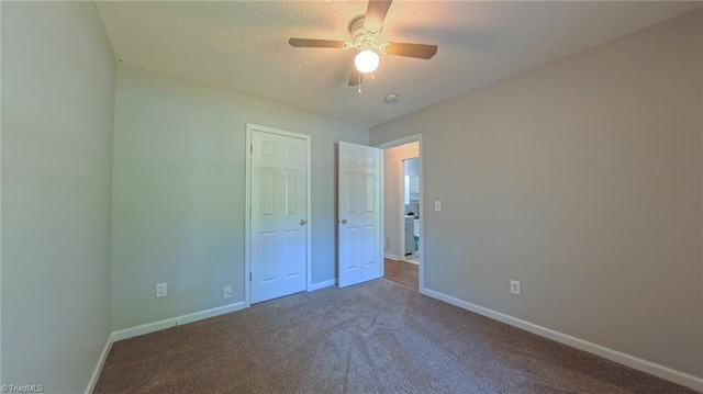 2309 Kasarda Dr, Greensboro, NC 27406 - unfurnished bedroom with a textured ceiling, carpet floors, baseboards, and ceiling fan