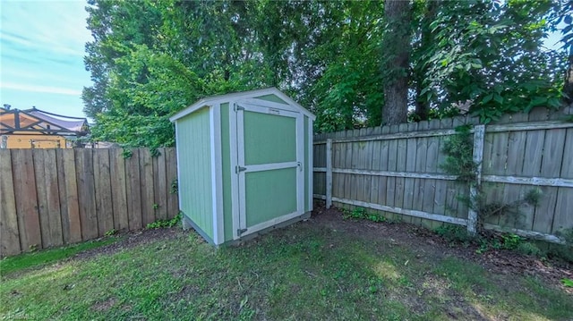 2309 Kasarda Dr, Greensboro, NC 27406 - view of shed with a fenced backyard