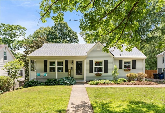 ranch-style home featuring roof with shingles