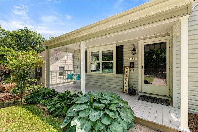 entrance to property with a porch