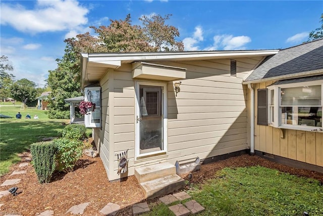 2606 Boone Trl, North Wilkesboro, NC 28659 - view of property exterior with a lawn and a shingled roof