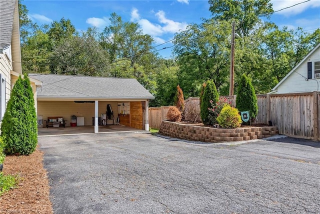2606 Boone Trl, North Wilkesboro, NC 28659 - view of parking / parking lot featuring fence and a carport