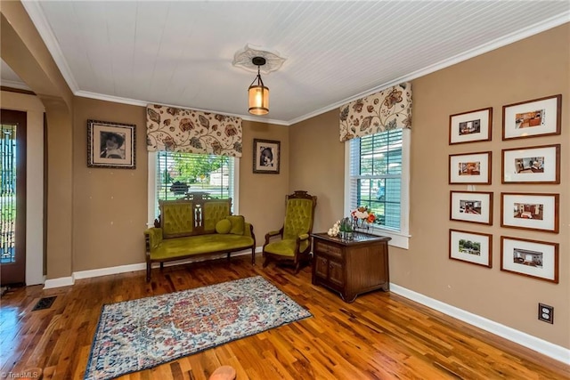 2606 Boone Trl, North Wilkesboro, NC 28659 - sitting room with wood finished floors, ornamental molding, and baseboards