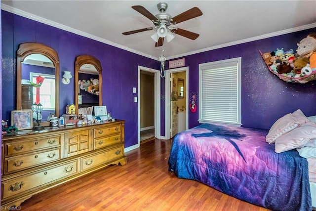 2606 Boone Trl, North Wilkesboro, NC 28659 - bedroom with wood finished floors, crown molding, ceiling fan, and baseboards
