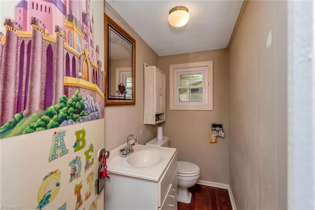 2606 Boone Trl, North Wilkesboro, NC 28659 - half bath with toilet, wood finished floors, baseboards, and vanity
