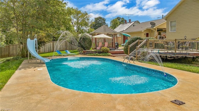 2606 Boone Trl, North Wilkesboro, NC 28659 - view of swimming pool with a water slide, a wooden deck, a fenced backyard, and a gazebo
