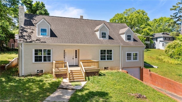 cape cod house with a wooden deck, a chimney, an attached garage, a front lawn, and brick siding