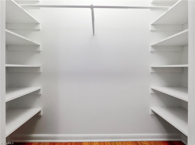 walk in closet featuring light wood-type flooring