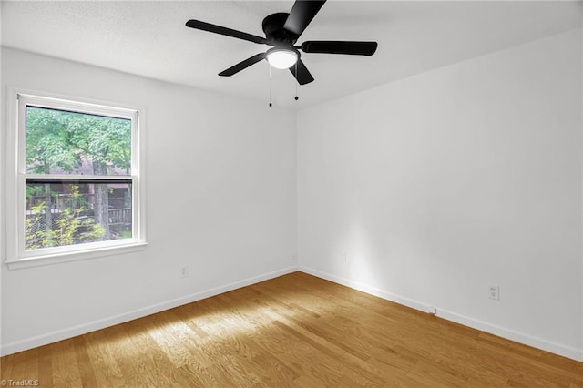 3114 Rockingham Rd, High Point, NC 27265 - empty room featuring wood finished floors and a ceiling fan