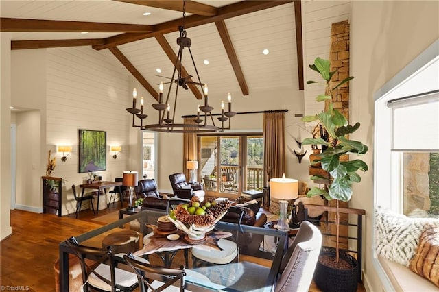 dining space with beamed ceiling, high vaulted ceiling, a chandelier, and hardwood / wood-style flooring