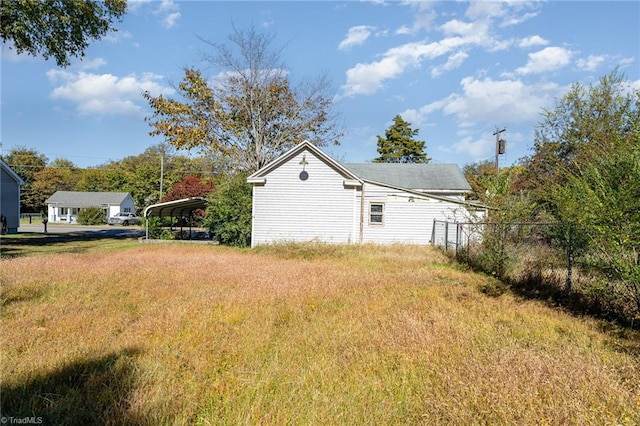 view of yard featuring a carport