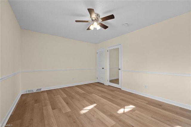 unfurnished bedroom featuring ceiling fan and light hardwood / wood-style flooring