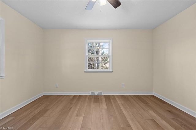 unfurnished room featuring ceiling fan and light hardwood / wood-style floors